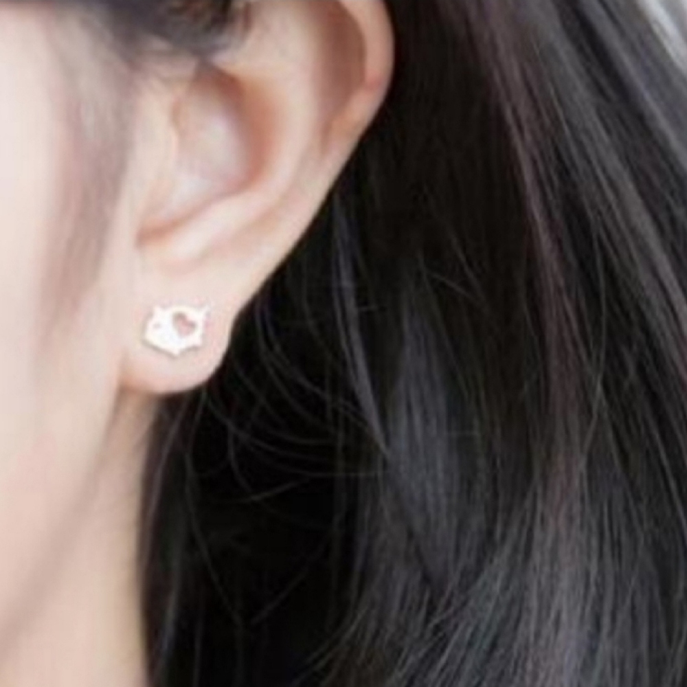 Sterling silver 925 curly tail piggy earrings.